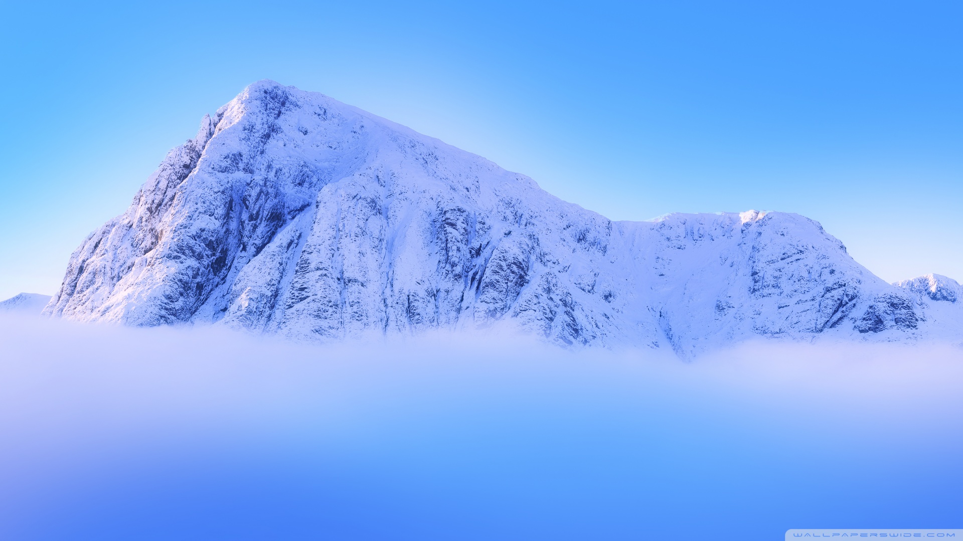 snowy_mountain_peak_above_clouds-wallpaper-1920x1080.jpg